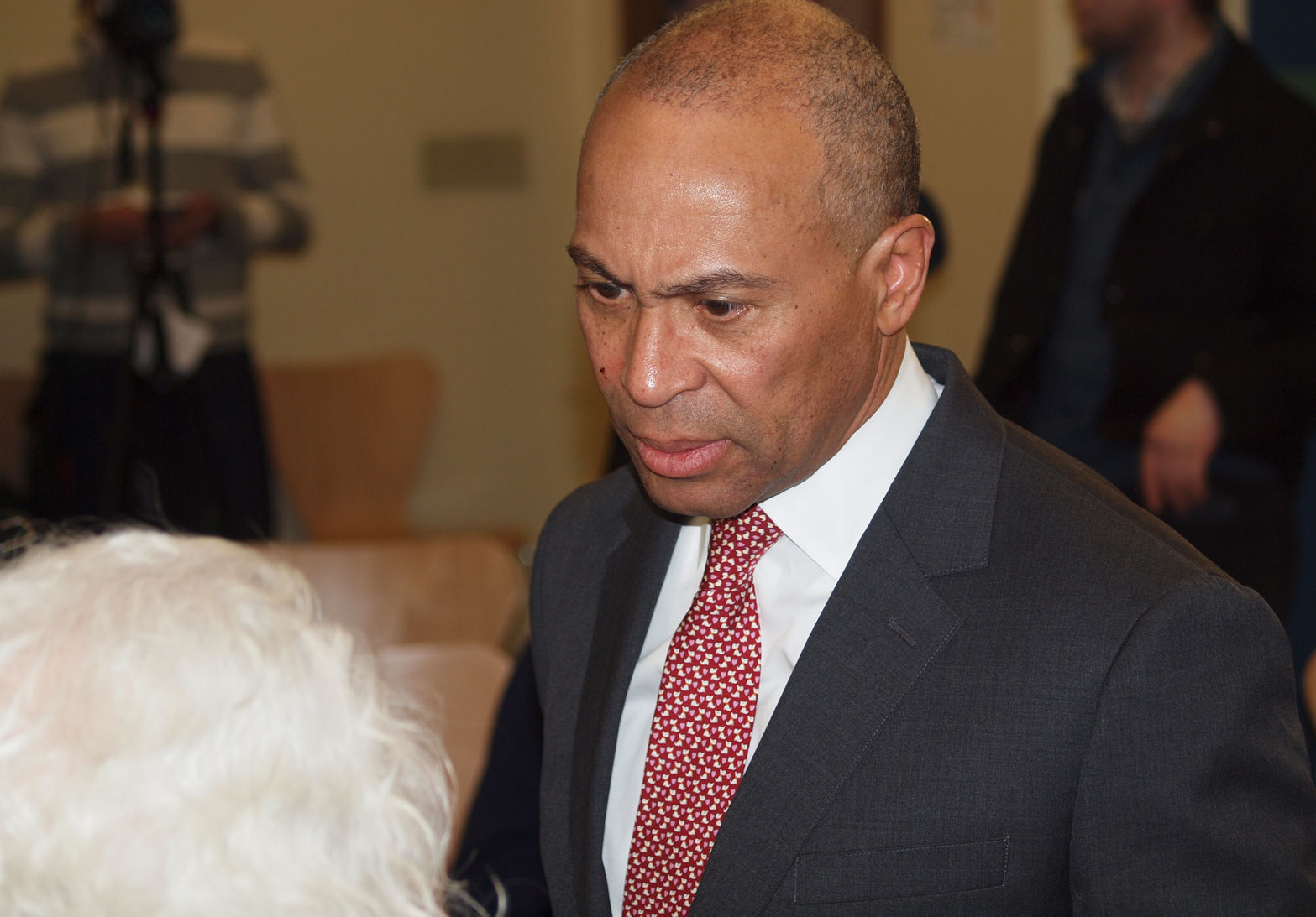 Deval Patrick speaks with person at the forum
